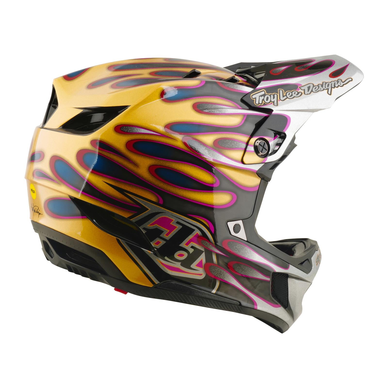 The TLD 26.1 D4 AS Carbon Helmet in Overspray Gold/Black is a full-face mountain bike helmet with Mips protection and "Troy Lee Designs" logo on the visor.
