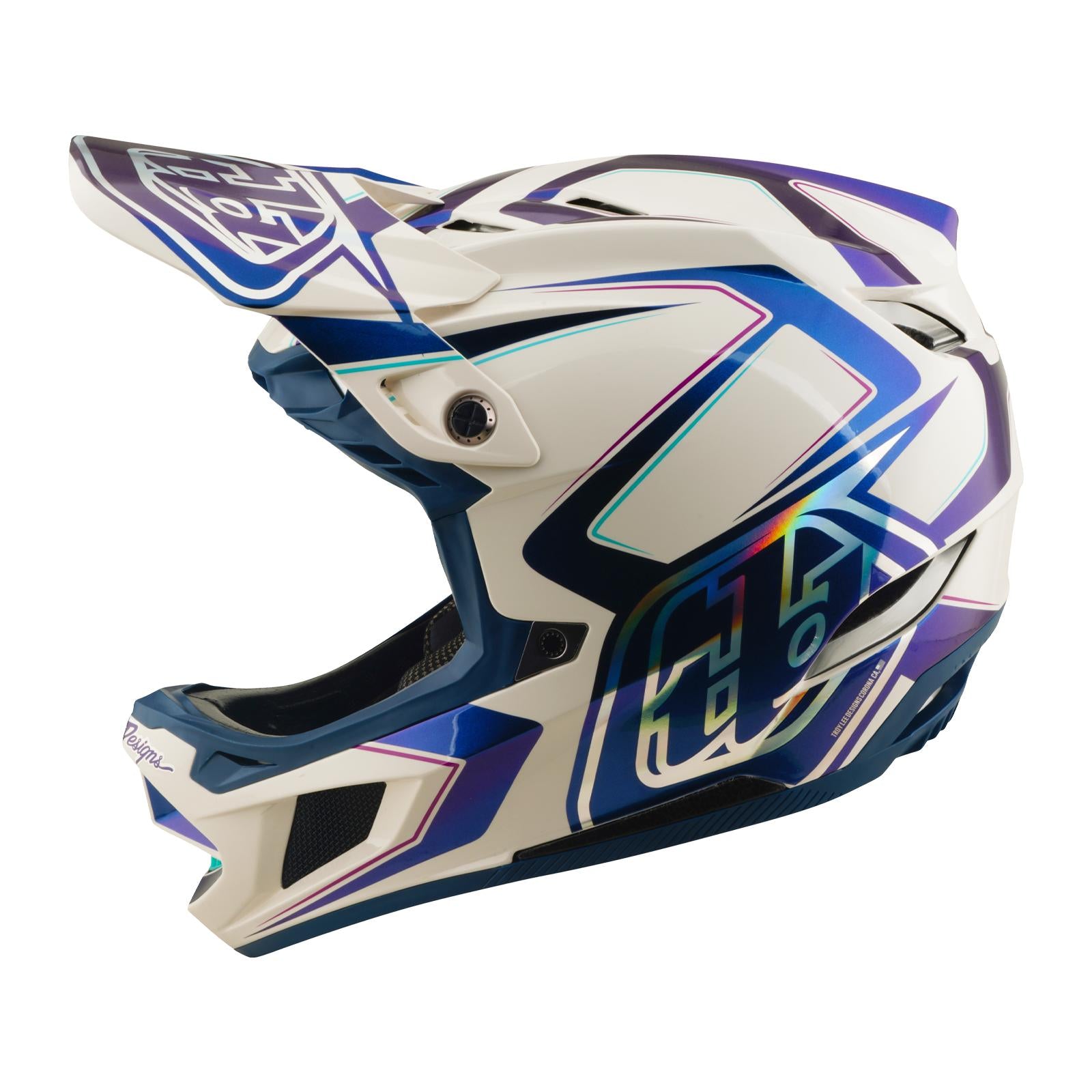The TLD 26.1 D4 AS Composite Helmet in Flared White/Indigo features geometric patterns and a visor, shown in side profile on a plain background, designed for BMX riders.