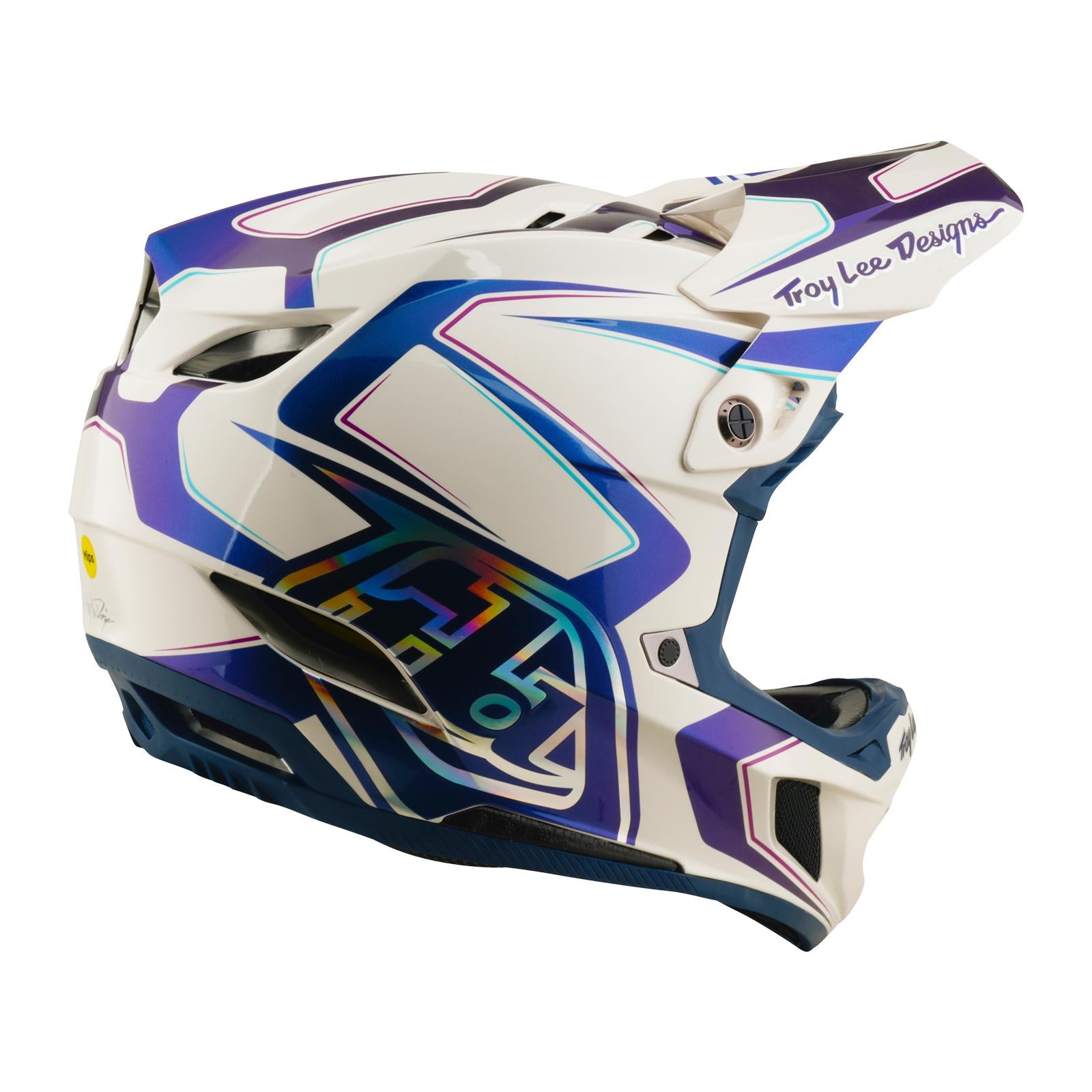 The TLD 26.1 D4 AS Composite Helmet in Flared White/Indigo features geometric purple and blue patterns, a "Troy Lee Designs" logo on the visor, and advanced Mips protection for enhanced downhill safety.