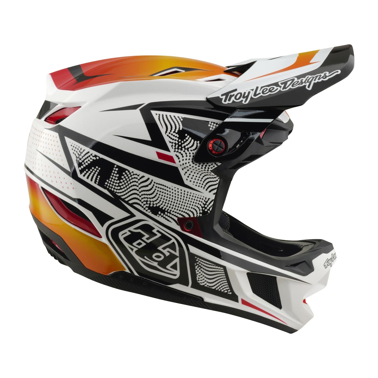 Side view of the TLD 26.1 D4 AS Composite Helmet / Lined Up White, featuring a visor, full-face coverage, bold black, white, red, and orange graphics with "Troy Lee Designs" branding, and Mips protection for enhanced safety.