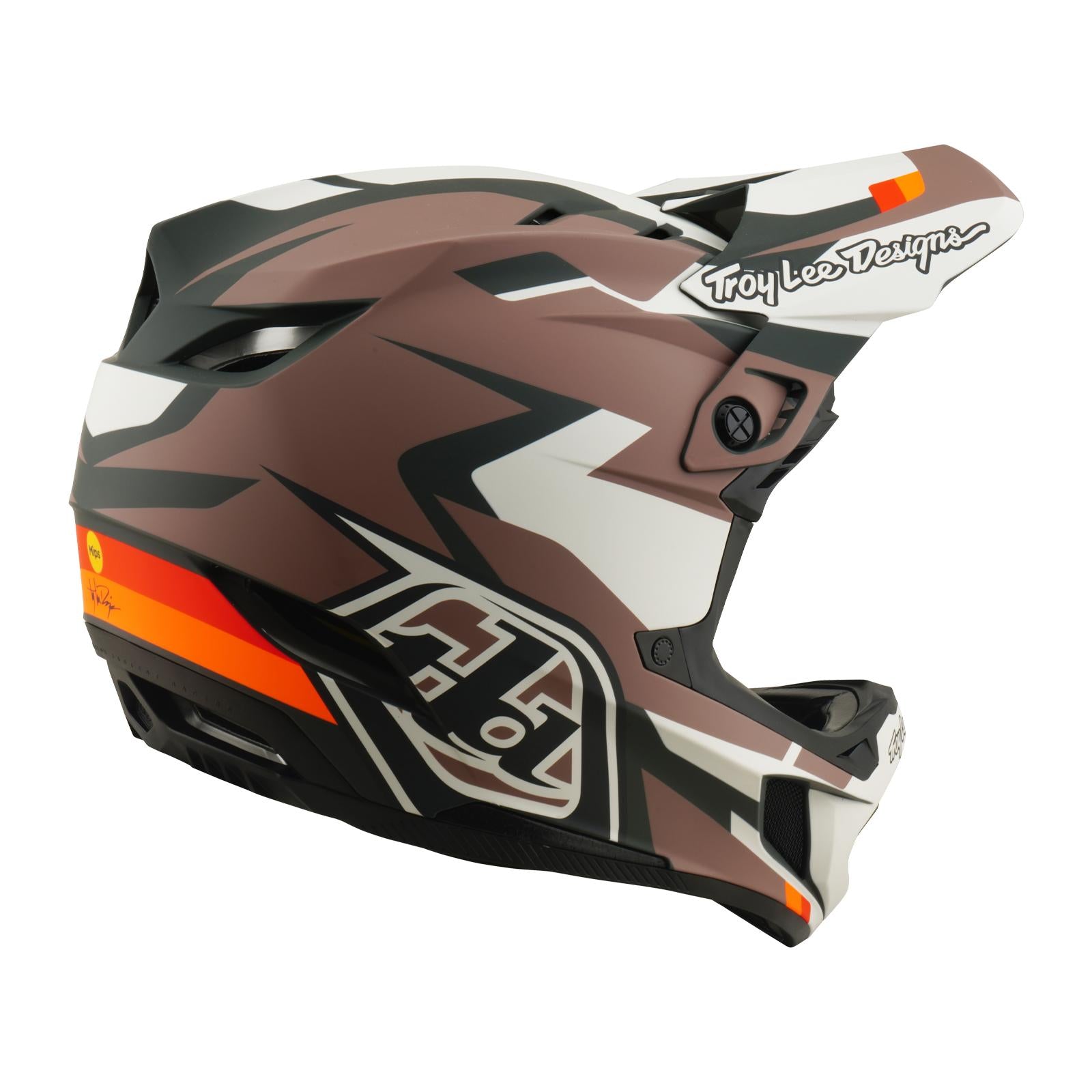 The TLD 26.1 D4 AS Polyacrylite Helmet / Roamer Clay is a full-face mountain biking helmet in brown, black, white, and orange with "Troy Lee Designs" branding, featuring advanced Mips brain protection for safety.