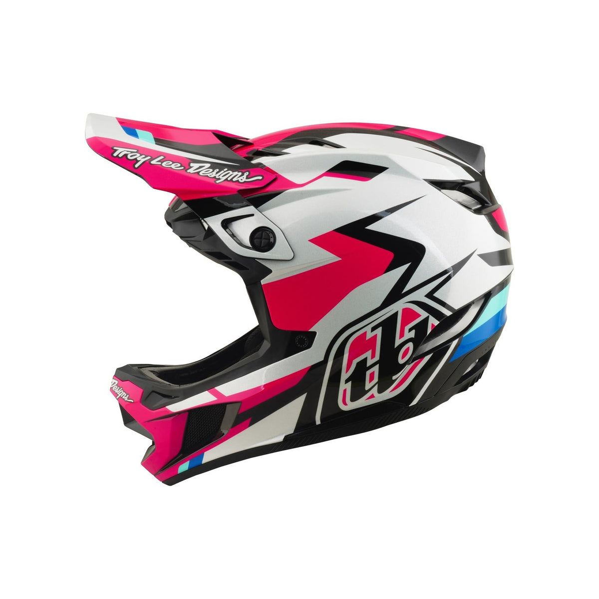 The TLD 26.1 D4 AS Polyacrylite Helmet / Roamer Magenta is a full-face helmet for motocross or mountain biking, featuring a pink, black, white, and blue geometric design, "Troy Lee Designs" logo on the visor, and Mips brain protection.