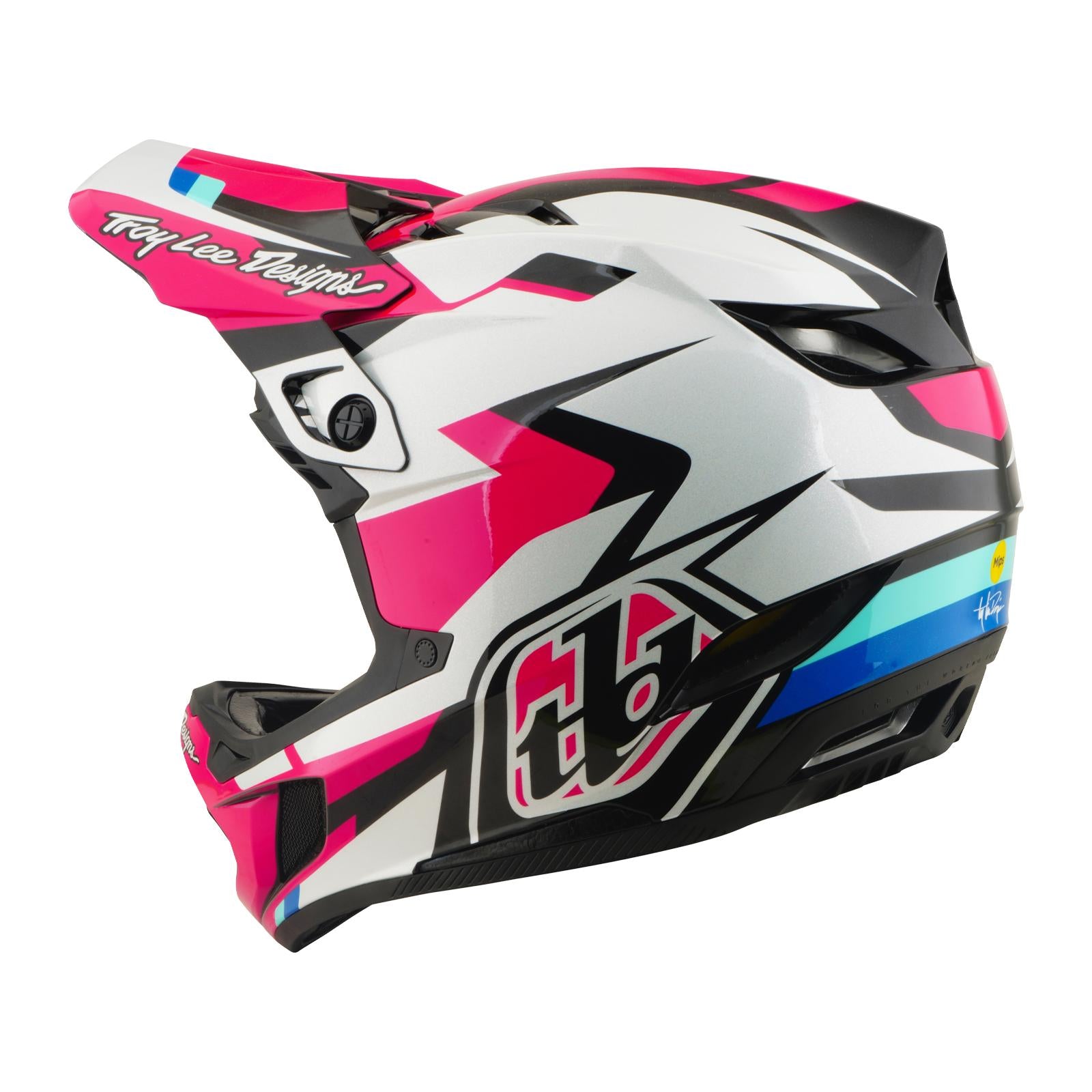 The TLD 26.1 D4 AS Polyacrylite Helmet / Roamer Magenta is a full-face mountain biking helmet with Mips brain protection, magenta graphics, visor, and ventilation openings.