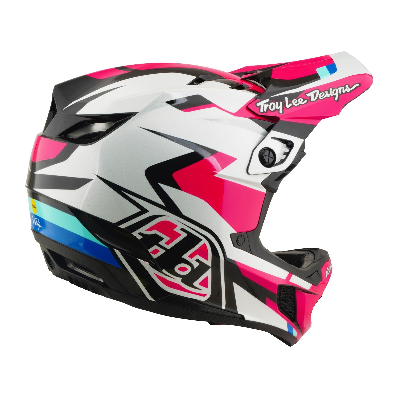 The TLD 26.1 D4 AS Polyacrylite Helmet / Roamer Magenta is a full-face motocross or MTB helmet with Mips brain protection and a bold magenta, black, white, and blue geometric design plus the "Troy Lee Designs" logo on the visor.