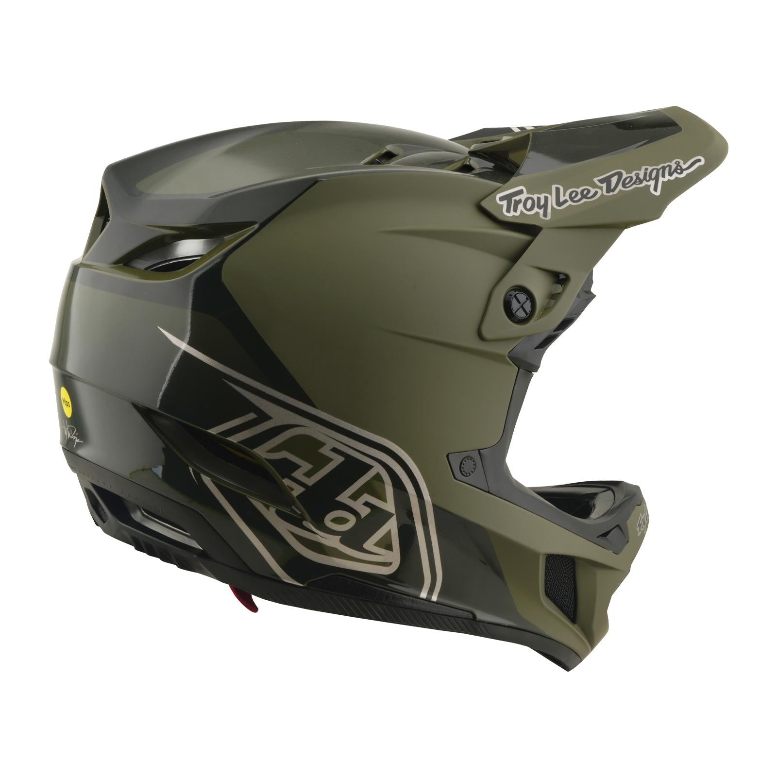The TLD 26.1 D4 AS Polyacrylite Helmet in Shadow Beetle is a matte green and black full-face MTB helmet with visor, Troy Lee Designs logo, Mips brain protection, angled design accents, and ventilation openings.