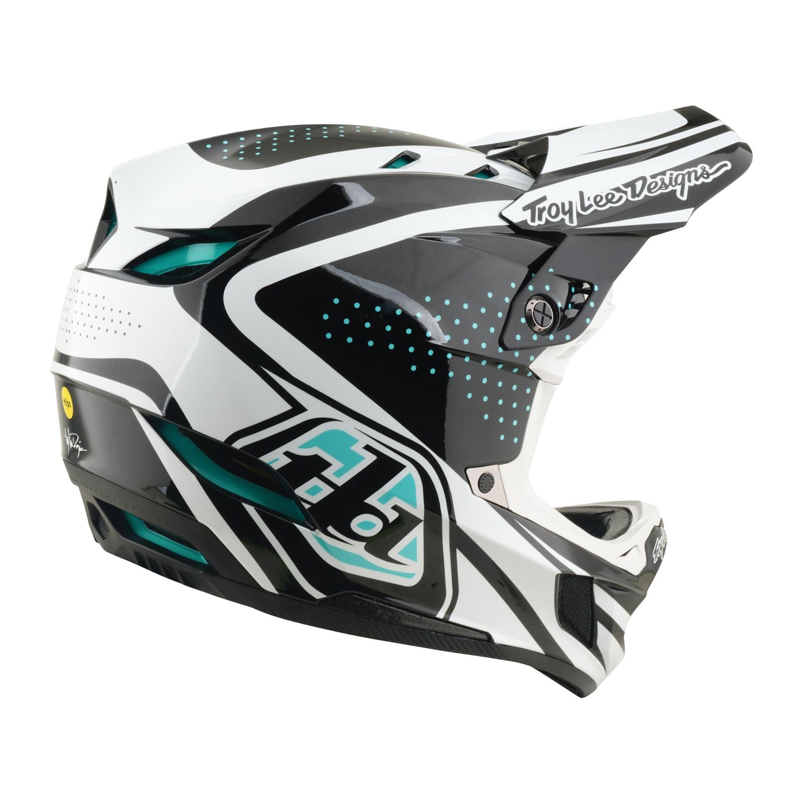 The TLD 26.1 D4 AS Polyacrylite Helmet in The Line Charcoal/White features bold geometric graphics, a "Troy Lee Designs" logo on the visor, and Mips brain protection for safer mountain biking.