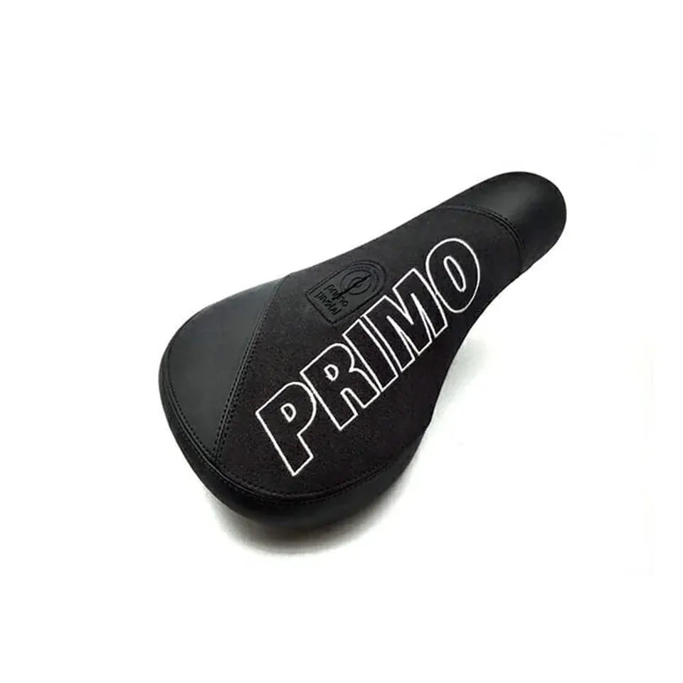 The Primo Breaker Pivotal Seat is a durable black BMX seat featuring the word “PRIMO” in bold white lettering across the top. Designed with a fat pivotal style, it’s an excellent choice for riders seeking both comfort and standout looks, shown here against a plain white background.