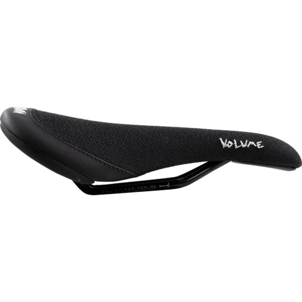 The Volume Full Roast Full Froth railed (Paul Theolen) is a black bicycle seat with minimal padding, a textured fabric cover, and "VOLUME" printed in white on the side.