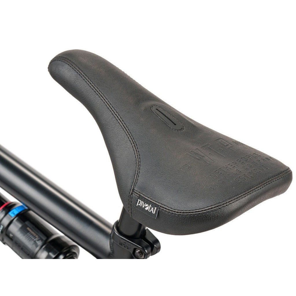 A close up of a black Wethepeople Swampmaster 20 Inch Bike saddle.