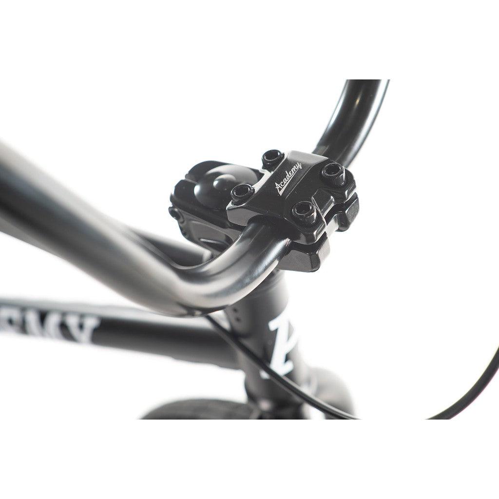 Close-up view of the handlebar stem on the Academy Entrant 20 Inch Bike, featuring the "Academy" brand etched on top—ideal for entry-level BMX enthusiasts.