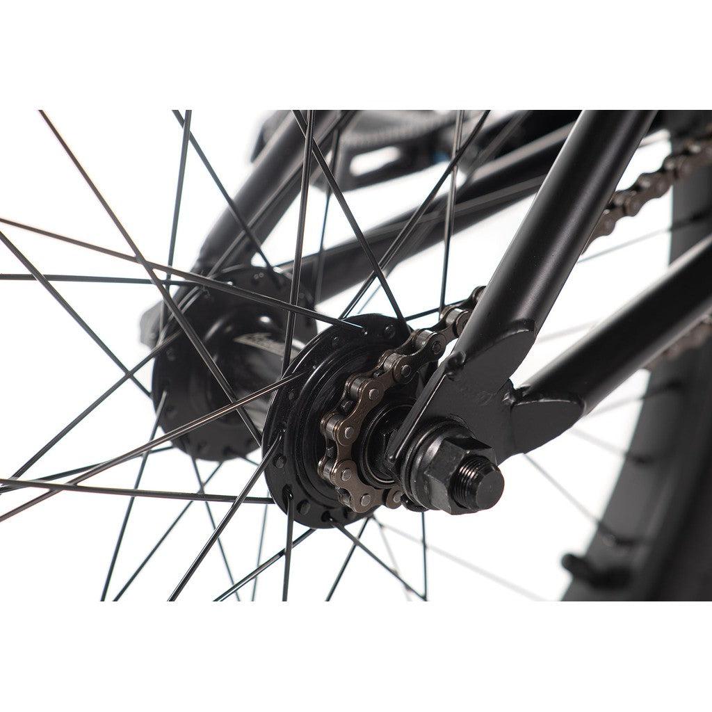 Close-up of the rear wheel on the Academy Trooper 20 Inch Bike, highlighting the gear and spokes, along with sealed hubs for a smooth ride.