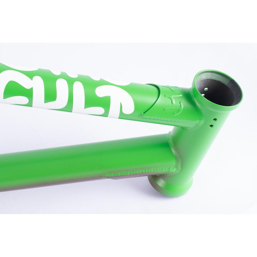 Close-up of the Cult Biggie Frame (Alex Kennedy Signature) in green with white lettering and visible welds, featuring investment cast dropouts, photographed against a white background.