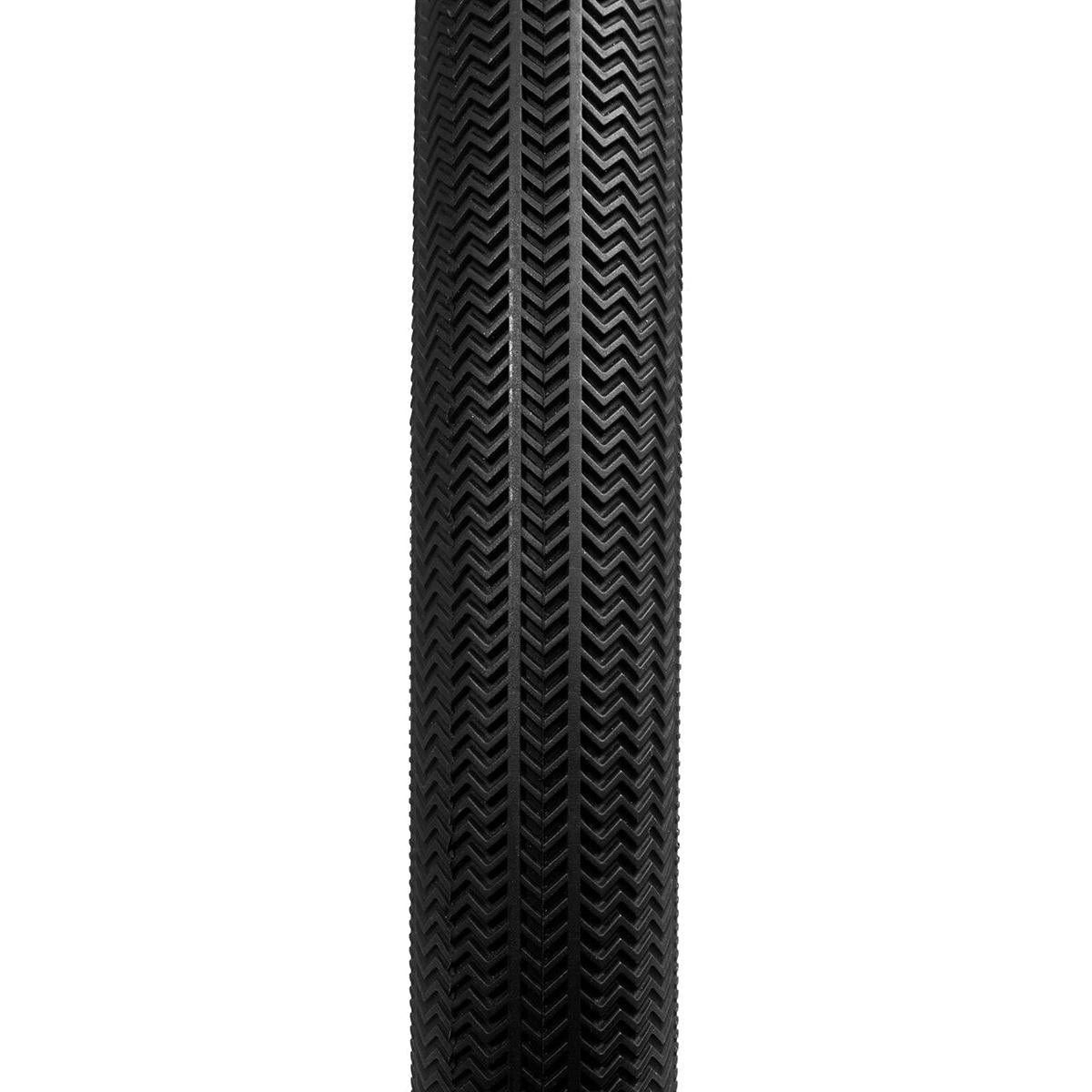 Close-up of the Alienation TCS R1 Tyre, a black racing tire with a herringbone tread pattern, displayed vertically against a white background. This tubeless and foldable design enhances performance and reliability.