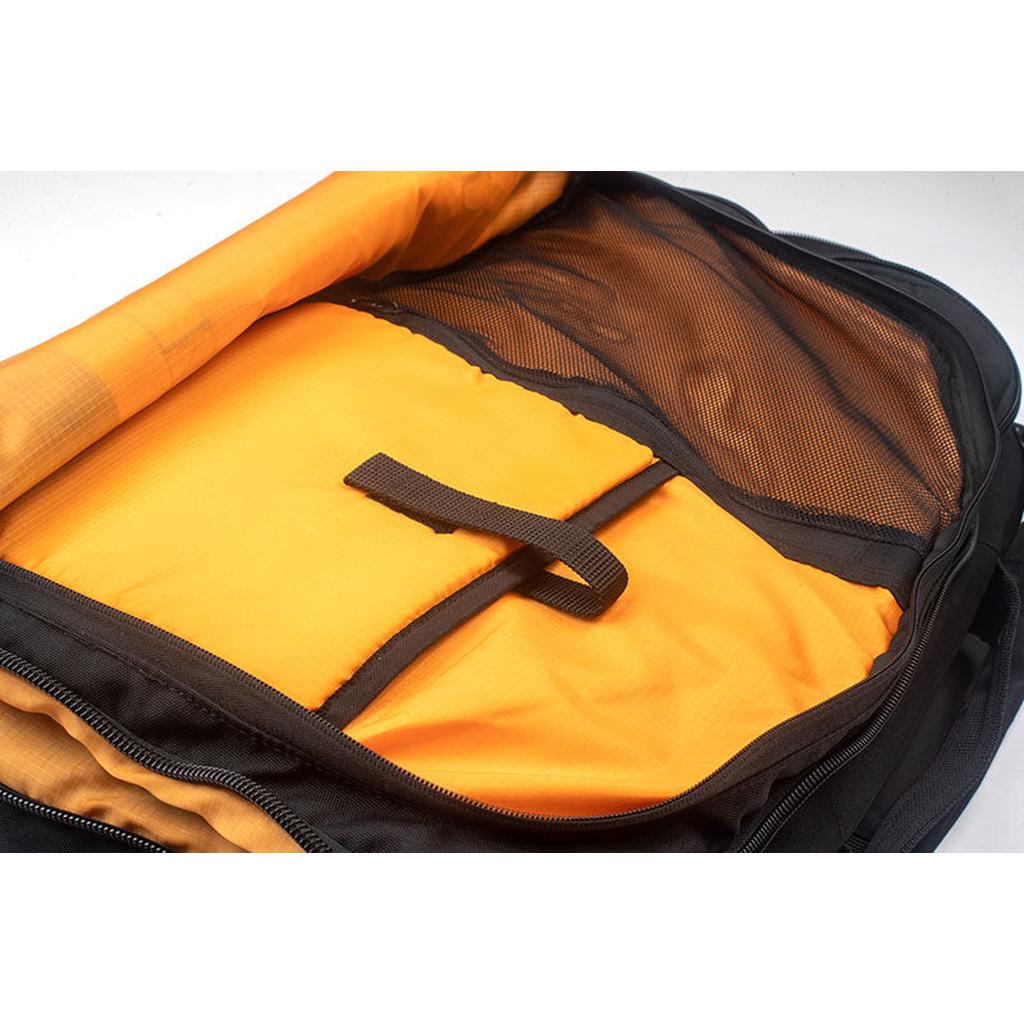 Open the Avian Chillmore Bag to reveal its orange interior, padded sleeve, black strap, and mesh zippered pocket—ideal for stylish racers wanting the ultimate race day bag.