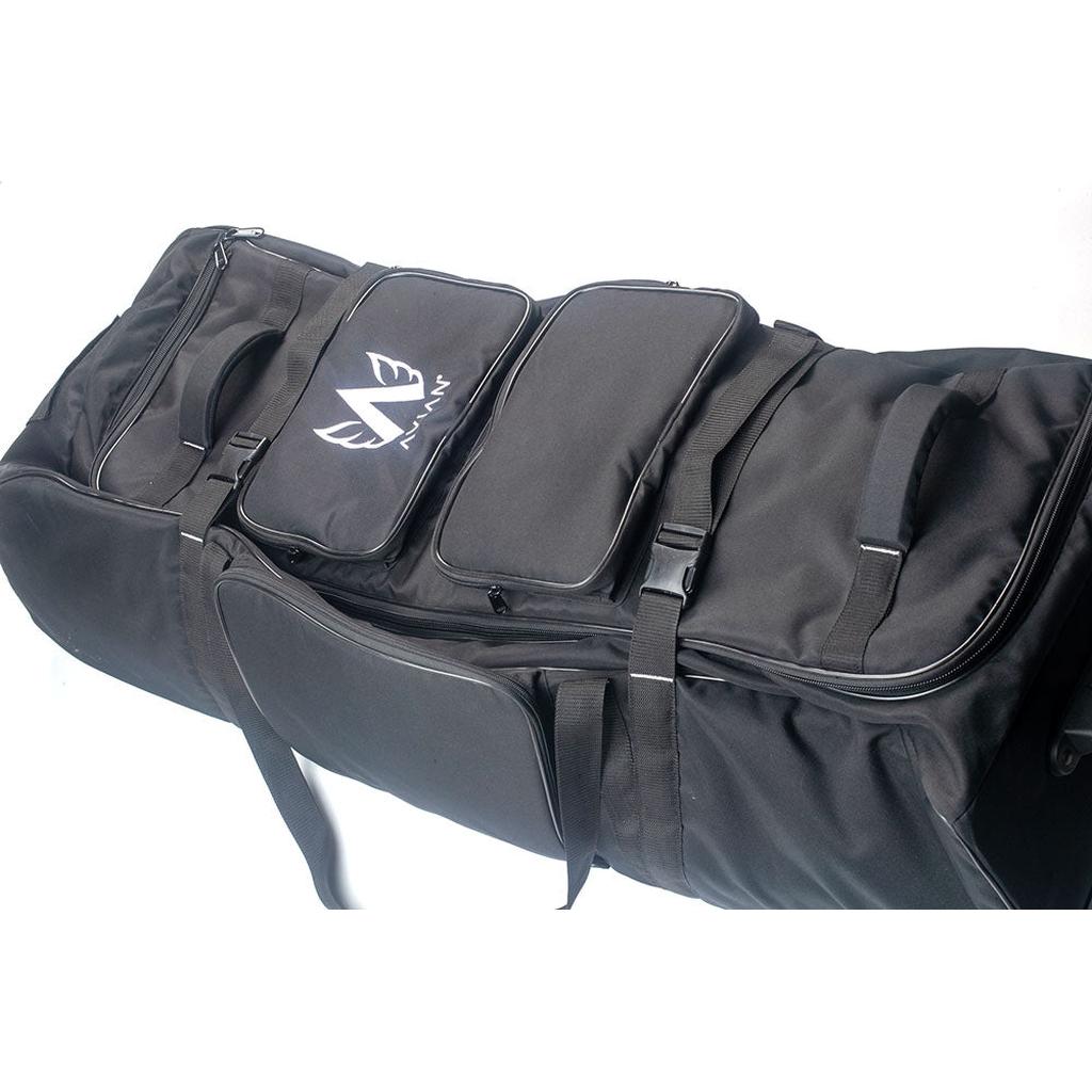 The Avian Gilmore V2 Flight Bag is a spacious black sports equipment bag with carrying straps, multiple zippered pockets, and a white bird logo—ideal for use as a flight bag or for bike travel.