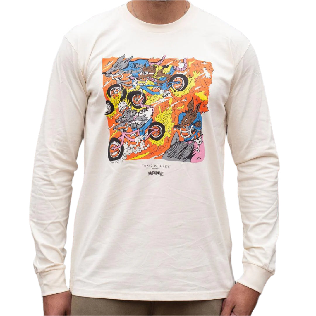 Someone is wearing the Backbone Rats On Bikes Long Sleeve Shirt, featuring a combed cotton design with a vibrant cartoon of cats and rats on motorcycles amid a fiery backdrop.