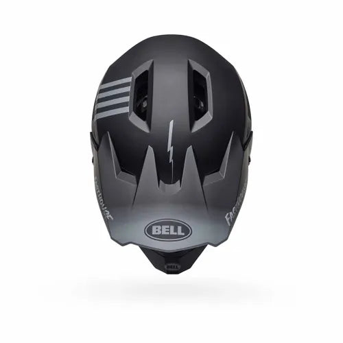 The Bell Sanction 2 DLX MIPS Fast House Matte Black is a lightweight BMX racing helmet with gray accents, a lightning bolt design, two ventilation slits, and the brand logo "Bell" on the front. It features MIPS technology for enhanced safety.