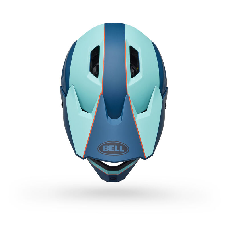 The Bell Sanction 2 DLX MIPS Matte Blue helmet has a front view with sharp, angular designs, MIPS technology for enhanced safety, and ventilation slits.
