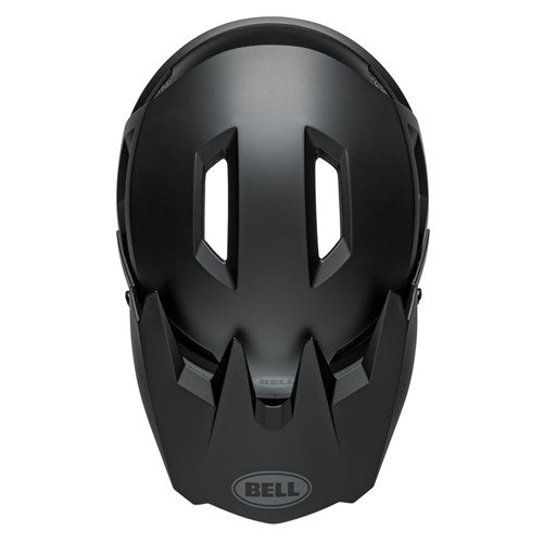 Top view of the Bell Sanction 2 Matte Black bicycle helmet showing two rectangular vents and the Bell logo on the front.
