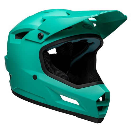 A matte turquoise Bell Sanction 2 off-road motorcycle helmet with a visor and mouth guard, featuring black interior padding and removable cheek pads for added comfort.