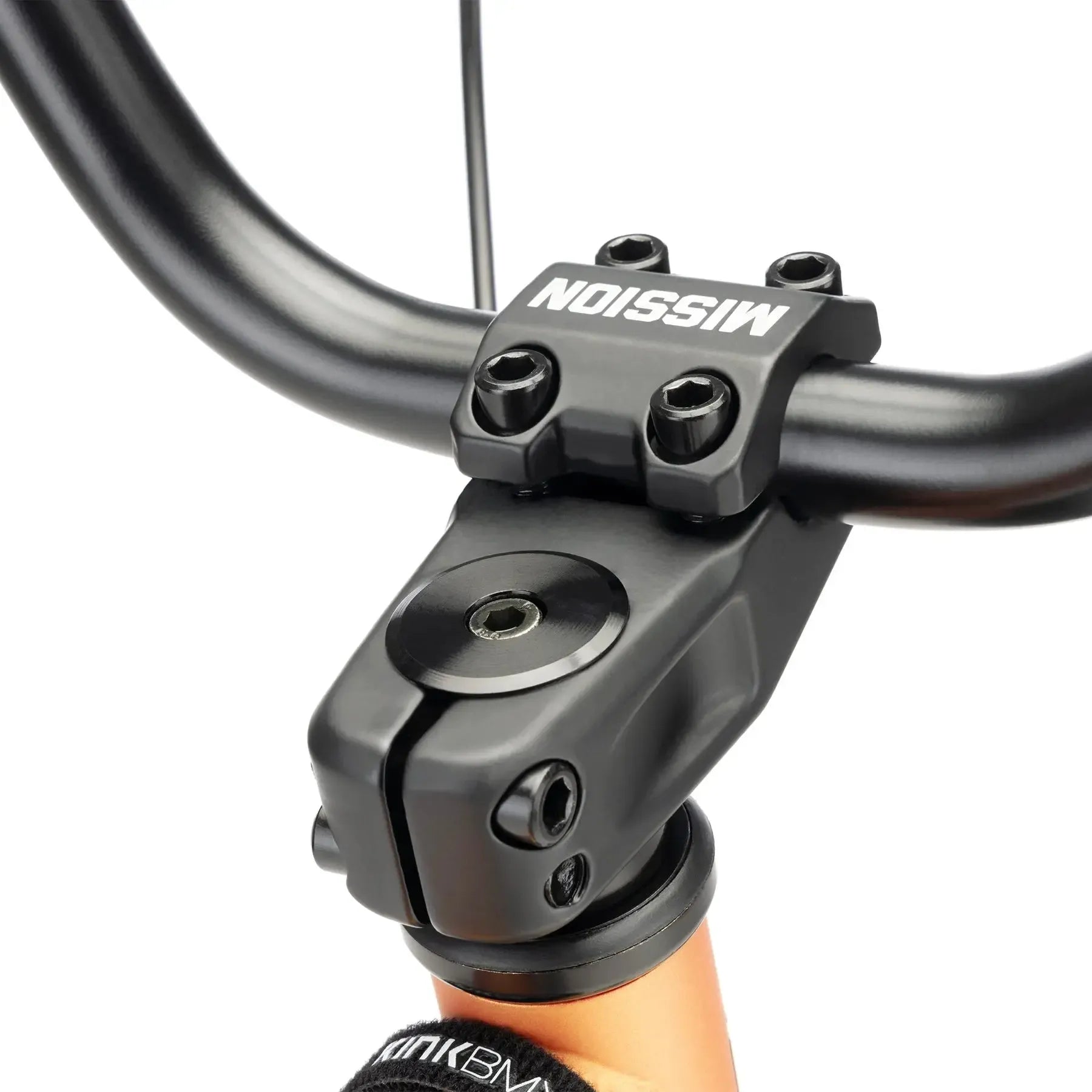 Close-up of a black 20" BMX handlebar and "MISSION" branded stem clamp—perfect for customizing your Kink Curb 20 Inch Bike (2026) or any beginner BMX setup.