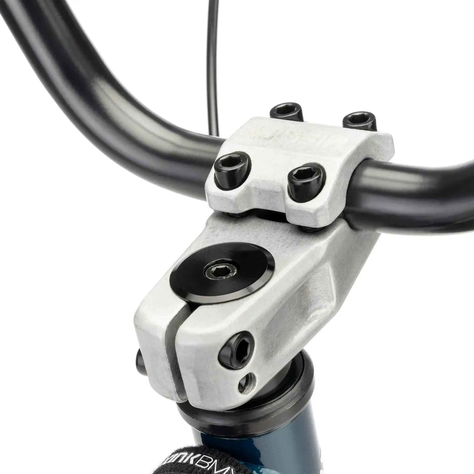 Close-up of a silver entry-level BMX stem securely gripping black handlebars with visible bolts and clamp, designed for the Kink Curb 20 Inch Bike (2026).