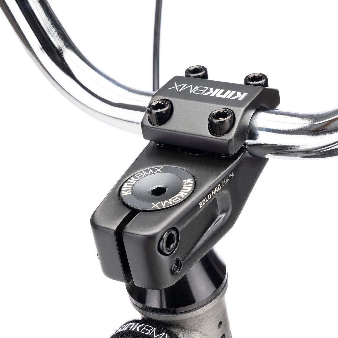 Close-up of the limited edition Kink Launch LTD 20 Inch Bike's black Bold HRD 50mm stem, securely mounted to chrome handlebars.