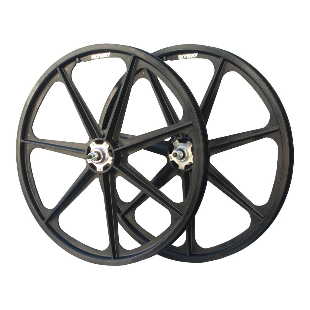 Skyway Tuff II Rivet 24 Inch Wheelset - a pair of black plastic moulded wheels with sealed bearings on a white background.