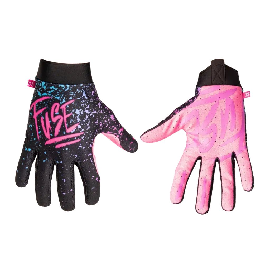A pair of Fuse Omega Turbo Gloves with pink and blue paint, offering exceptional performance.