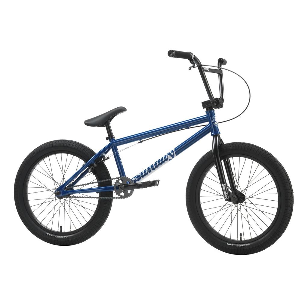 Sunday Primer 20 Inch Bike in blue and black, featuring a single gear, black handlebars, and black tires, shown from the side against a white background.