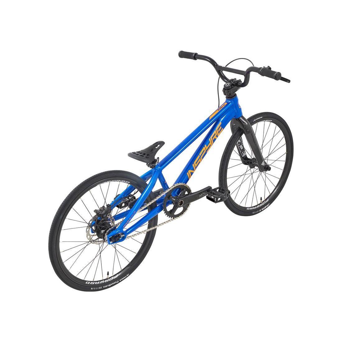 The Inspyre Evo-C Disc Junior Bike 2026 features a blue BMX-style frame, black seat, handlebars, and tires, plus Shimano hydraulic disc brakes, as shown on a white background.