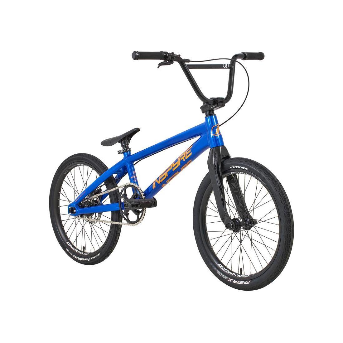 The Inspyre Evo-C Disc Pro XL Bike 2026 is a blue BMX race bike with a premium aluminum frame, black handlebars and wheels, and bold yellow "INSPIRE" branding, displayed against a white background.