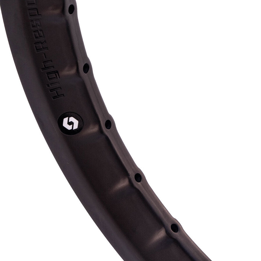 A close up of a Box Hex Lab Carbon Fibre Rim (451 - 20x1-1/8 and 20x1-3/8), ideal for performance race applications in the BMX race market.