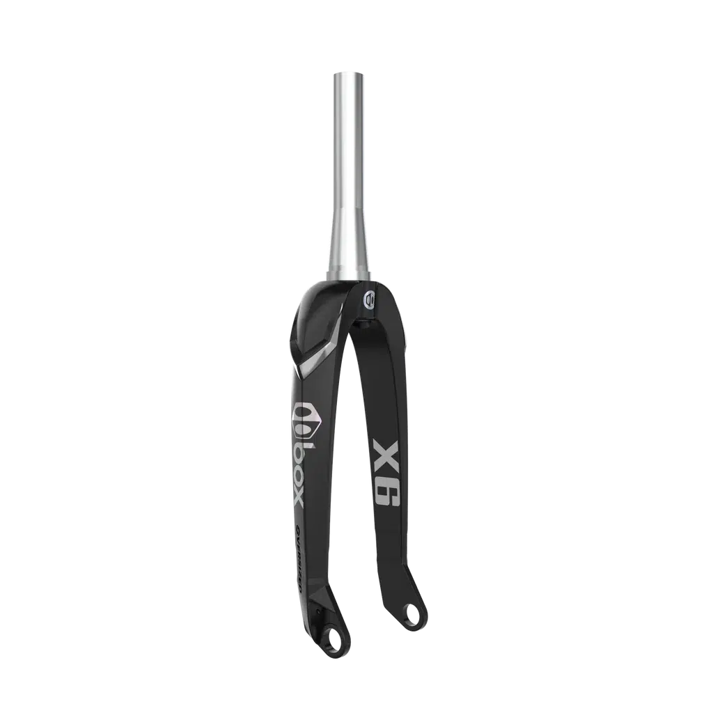 A sleek Black Box Hex Lab Oversized X6 Pro 20 Inch 20mm Tapered Carbon bicycle fork featuring a titanium steerer tube, showcased against a solid black background, perfect for any BMX race enthusiast.