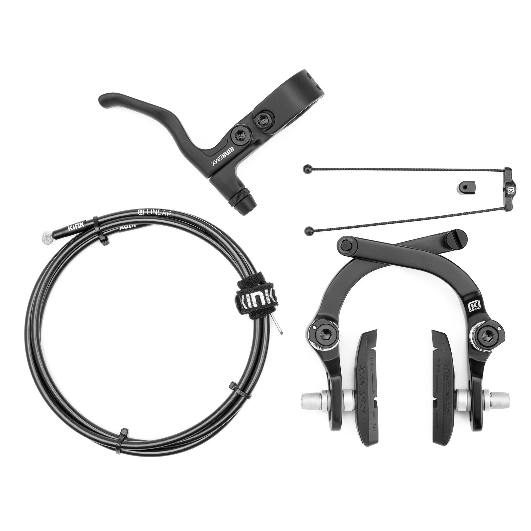 The Kink Desist II Brake Kit in black—featuring lever, brake arms, Kool-Stop pads, cable, and hardware—is displayed on a white background, offering BMX riders reliable stopping power.