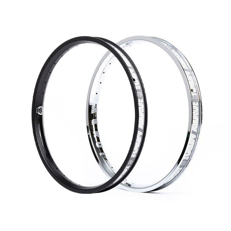 A pair of black and white BSD Aero Pro rims on a white background, showcasing their aerodynamic styling and strength.