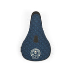 A BSD Grime (Denim Cox) Pivotal Seat with a skull and crossbones design, perfect for cyclists who crave speed and want to make a bold statement.