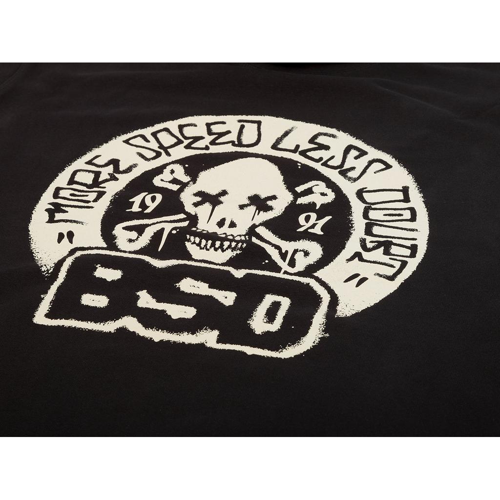 BSD More Speed Hoodie: A black t-shirt with a white skull, wrenches, "1991," and phrases "MORE SPEED LESS DOUBT" and "BSD." Ideal for those who enjoy groovy styles with an edgy flair.