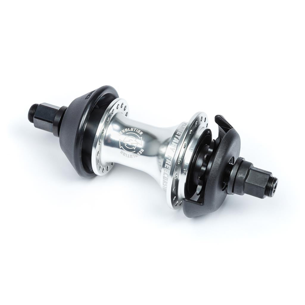 The BSD Revolution Rear Freecoaster Hub, with silver finish and black axle ends, showcases an innovative planetary clutch system for smooth performance, set against a white background.