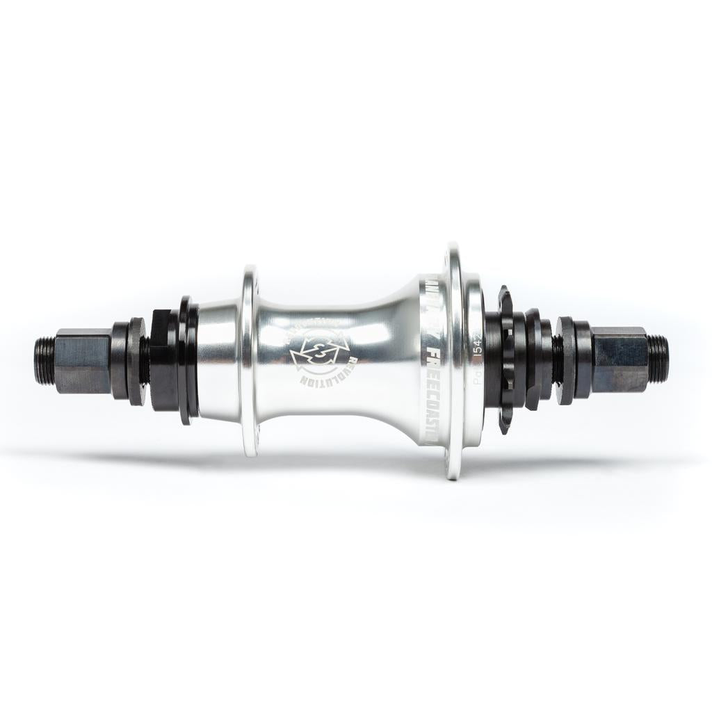 Framed against a plain white background, the BSD Revolution Rear Freecoaster Hub features silver with black threaded ends and an innovative planetary clutch system, viewed from the side.