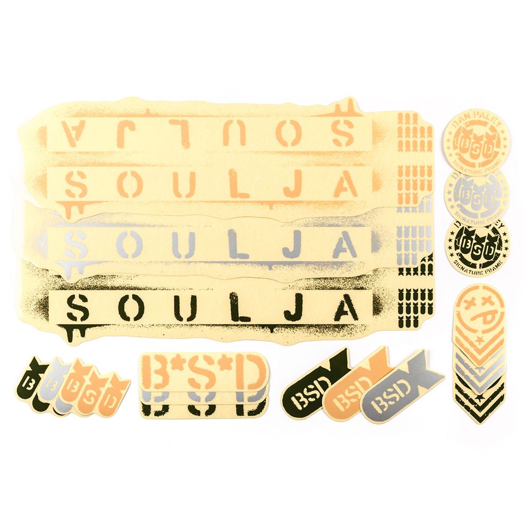 The BSD Soulja Frame 2019 Decal Set includes a variety of yellow, black, and white stickers featuring the words "SOULJA" and "BSD" in diverse designs and styles, making it an ideal choice for replacement sticker packs.