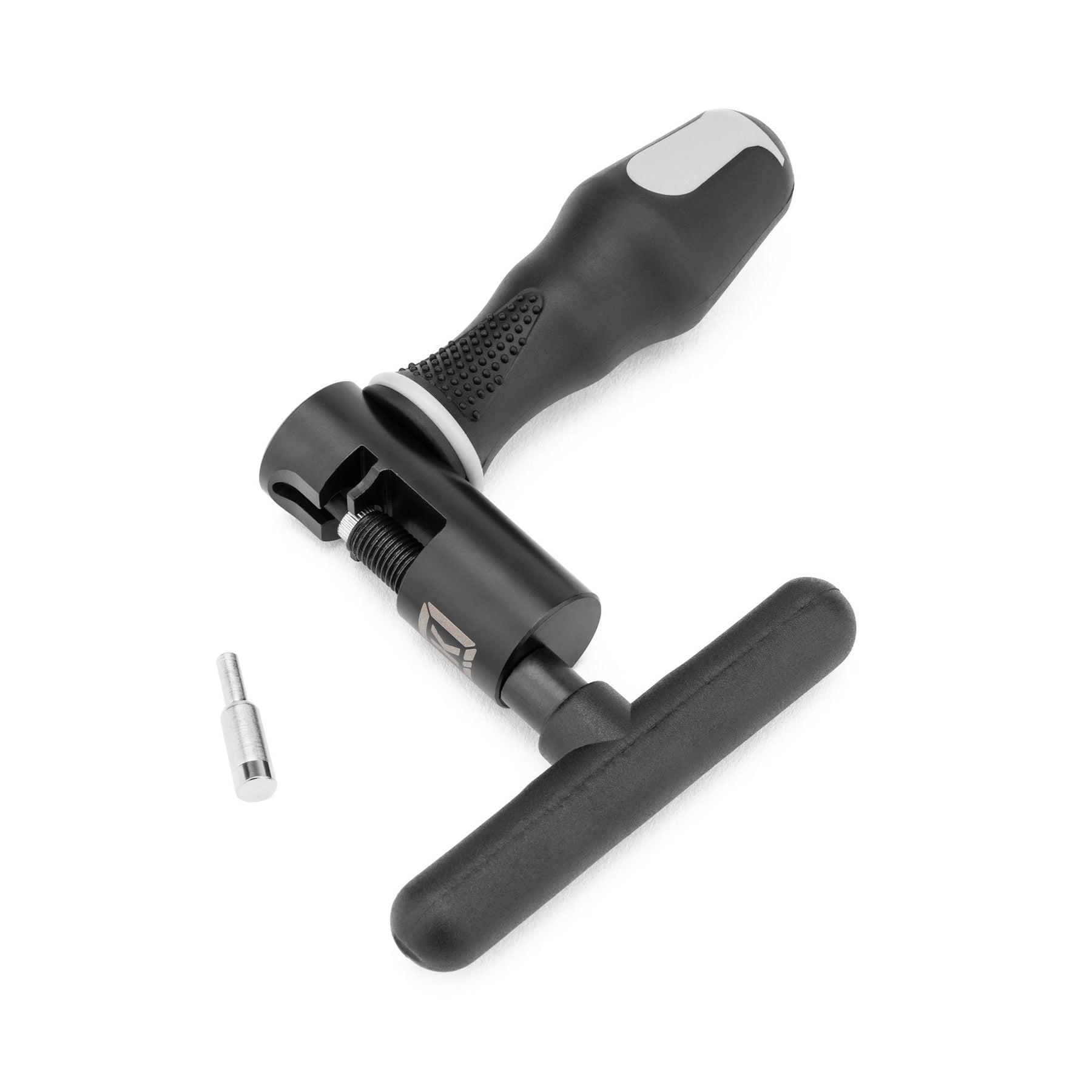 The Kink Survival Chain Breaker, shown in black and silver with a textured handle and separate metal pin, is perfect for BMX chain maintenance or adjusting half-link chains.