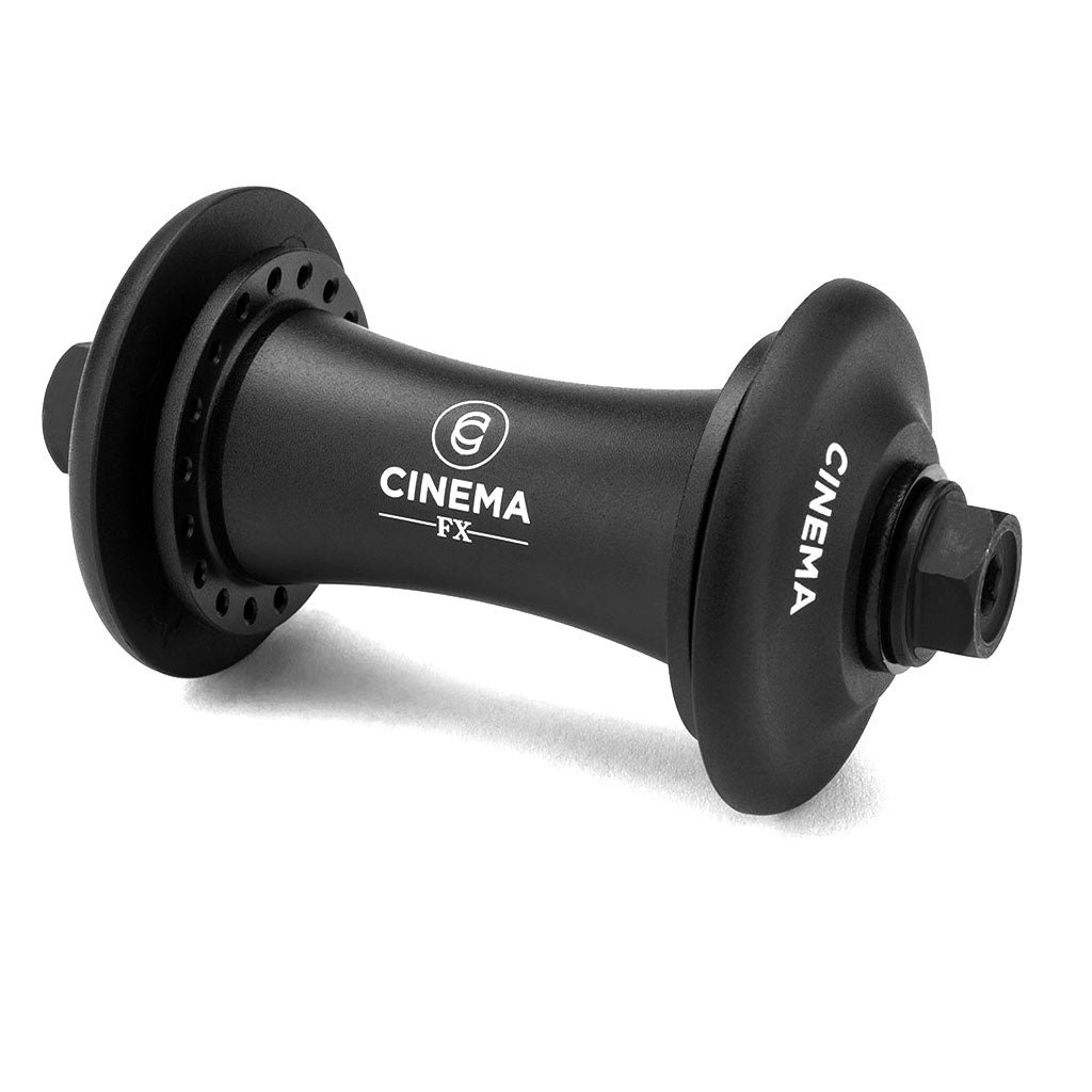 Close-up of a black Cinema FX Front Hub on a BMX bike, showcasing its flanges, bolts, and the iconic white Cinema logo. The hub features a durable chromoly inner axle and comes with protective nylon hub guards.