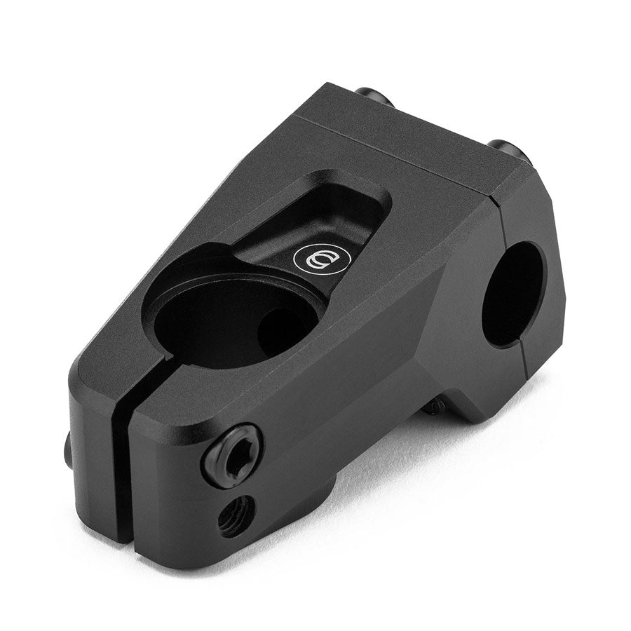 A black, metal Cinema Projector Stem with a bolt-clamp design, crafted for seamlessly connecting handlebars to the steerer tube of a bike.