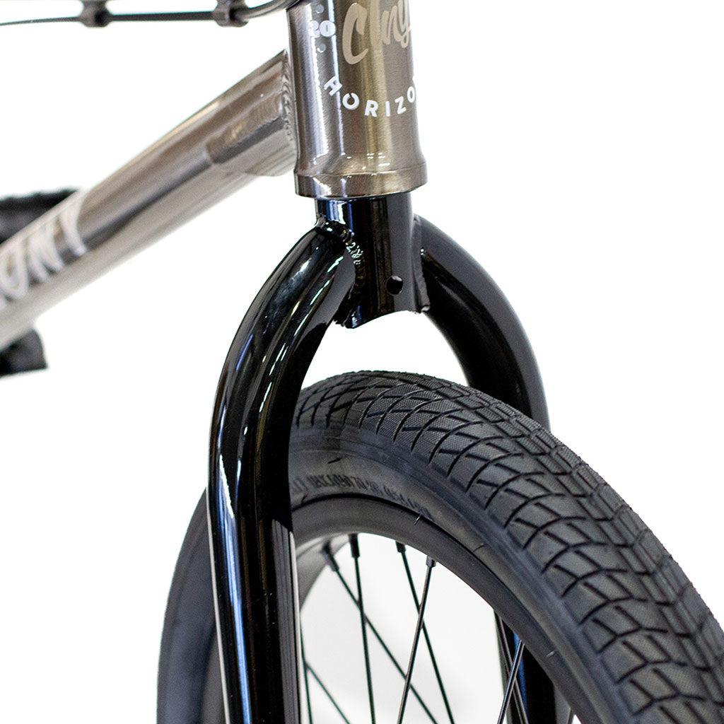 Close-up of the Colony Horizon 20 Inch Bike's front fork, tire, and part of its lightweight alloy frame, shown against a white background.