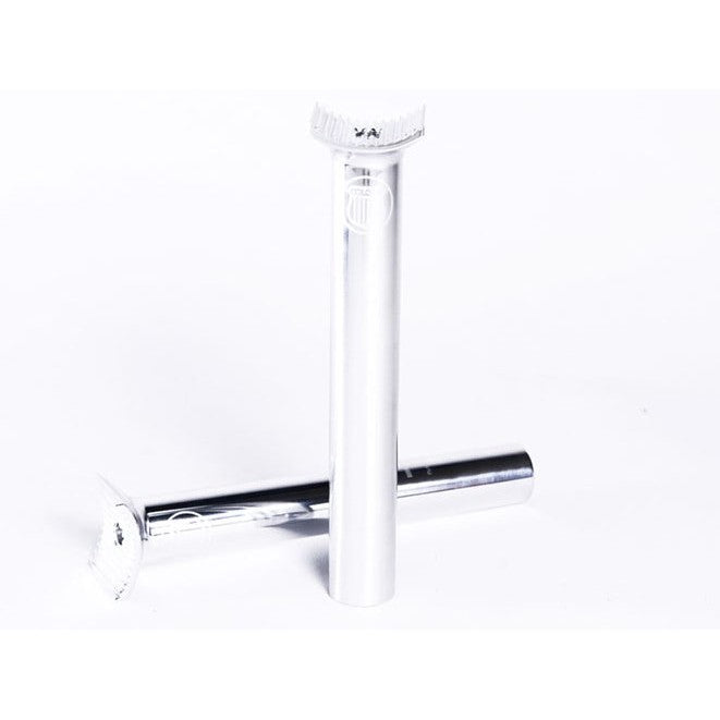 Two cylindrical metallic Colony Pivotal Seat Posts (185mm), one upright and one horizontal with white caps, displayed on a plain white background.