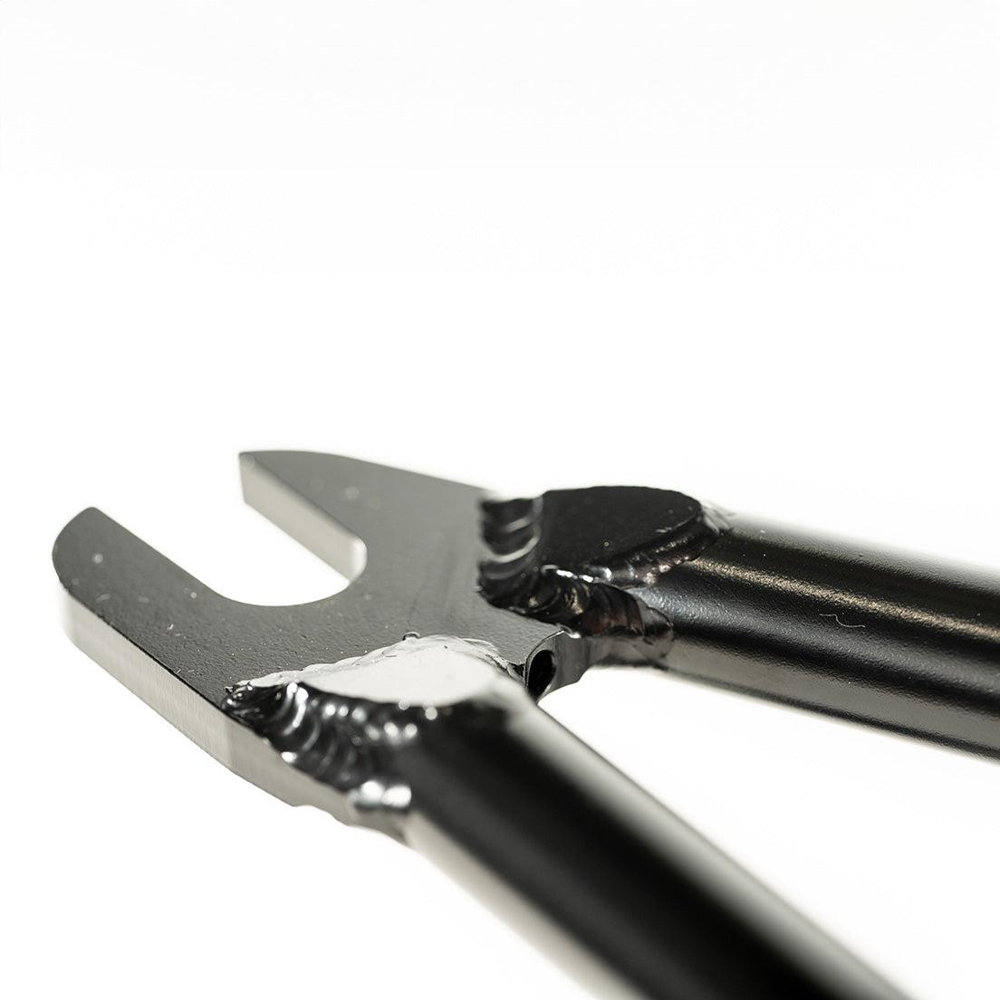 A Colony Rico 'Lite' Frame on a white background, held expertly by technical wizard Paterico Fallico.