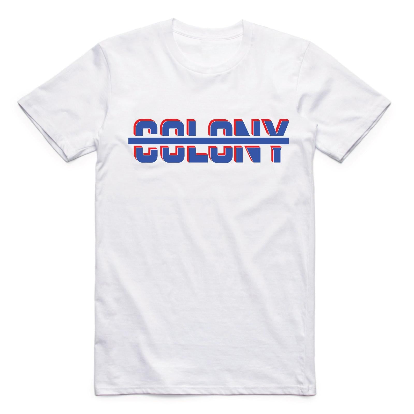 Introducing the Colony Strikethrough T-Shirt: this regular fit tee in white showcases "COLONY" in striking bold red and blue colors, artistically crossed by a sleek blue line. Made from soft carded cotton, it combines comfort and style effortlessly.