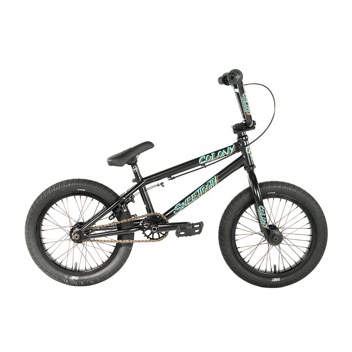 The Colony Sweet Tooth Pro Elite 16 Inch Bike features a sleek black frame adorned with distinctive "Colony" and "Sweet Tooth Pro" decals, complemented by thick tires and a padded seat, ideal for thrilling rides.