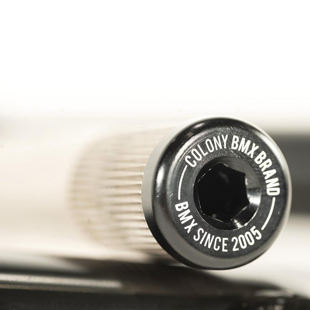 A close up of a Colony Venator 140mm Cranks (Suit 18" Wheeled Bikes) bicycle pedal with the word "Colony" on it.